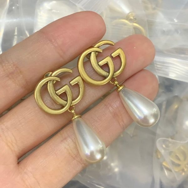 Boucles d'oreilles élégantes à clous avec lettre GG – Plaqué or minimaliste Luxe Code 1326