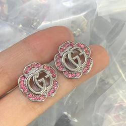 Boucles d'oreilles élégantes à clous avec lettre GG – Plaqué or minimaliste et luxe