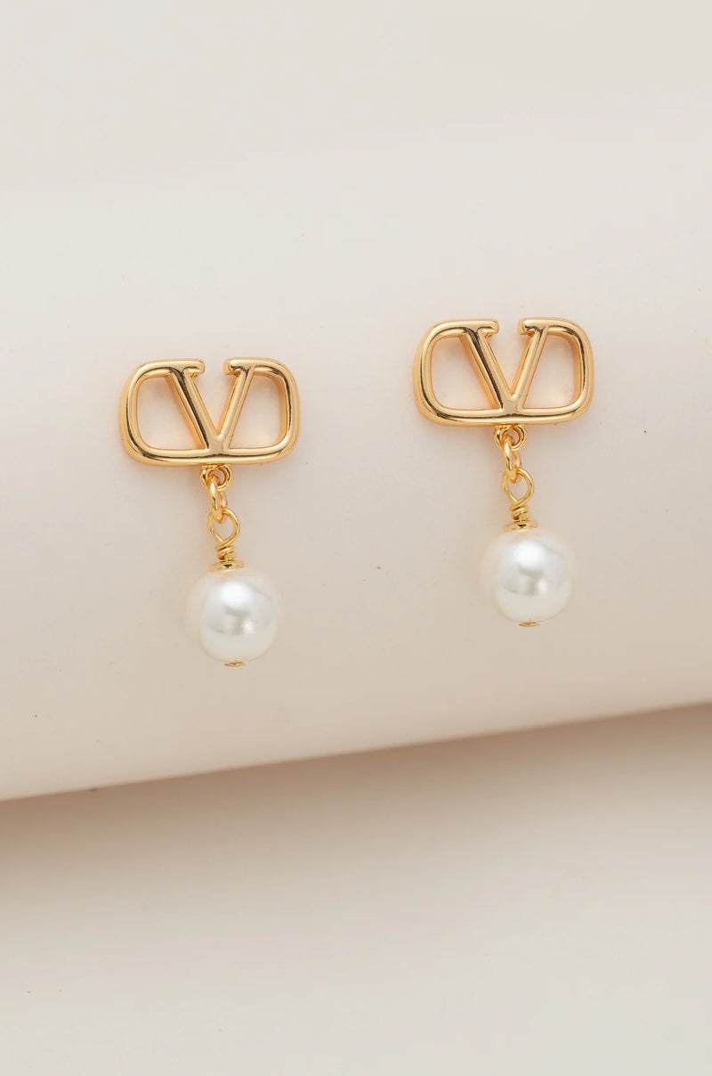 Boucles d'oreilles dorées rayonnantes