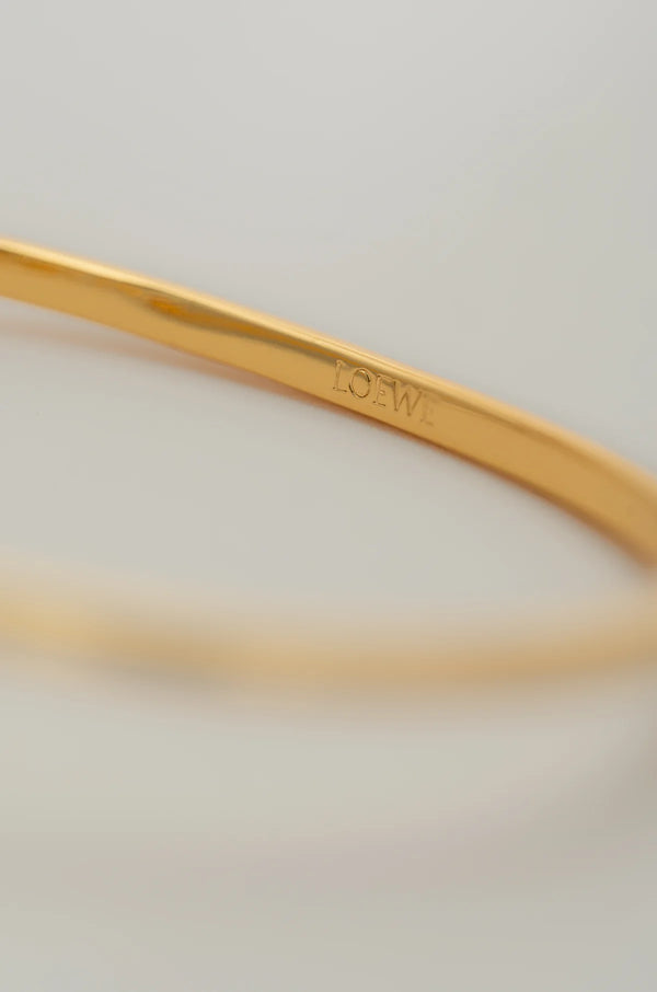 Bracelet à paillettes dorées