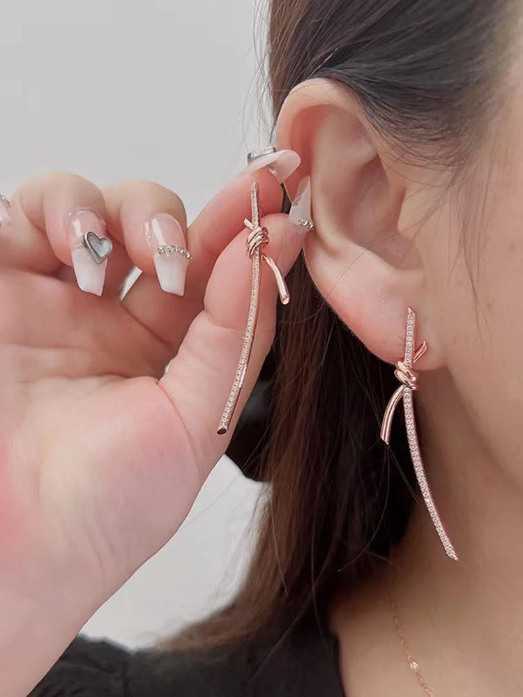 Boucles d'oreilles pendantes Knot, or rose, or et or blanc